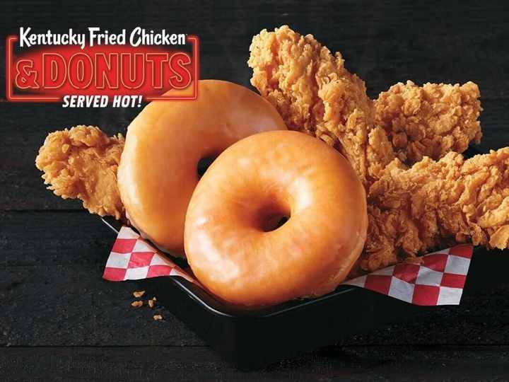 KFC basket with tender fried chicken and donuts. KFC